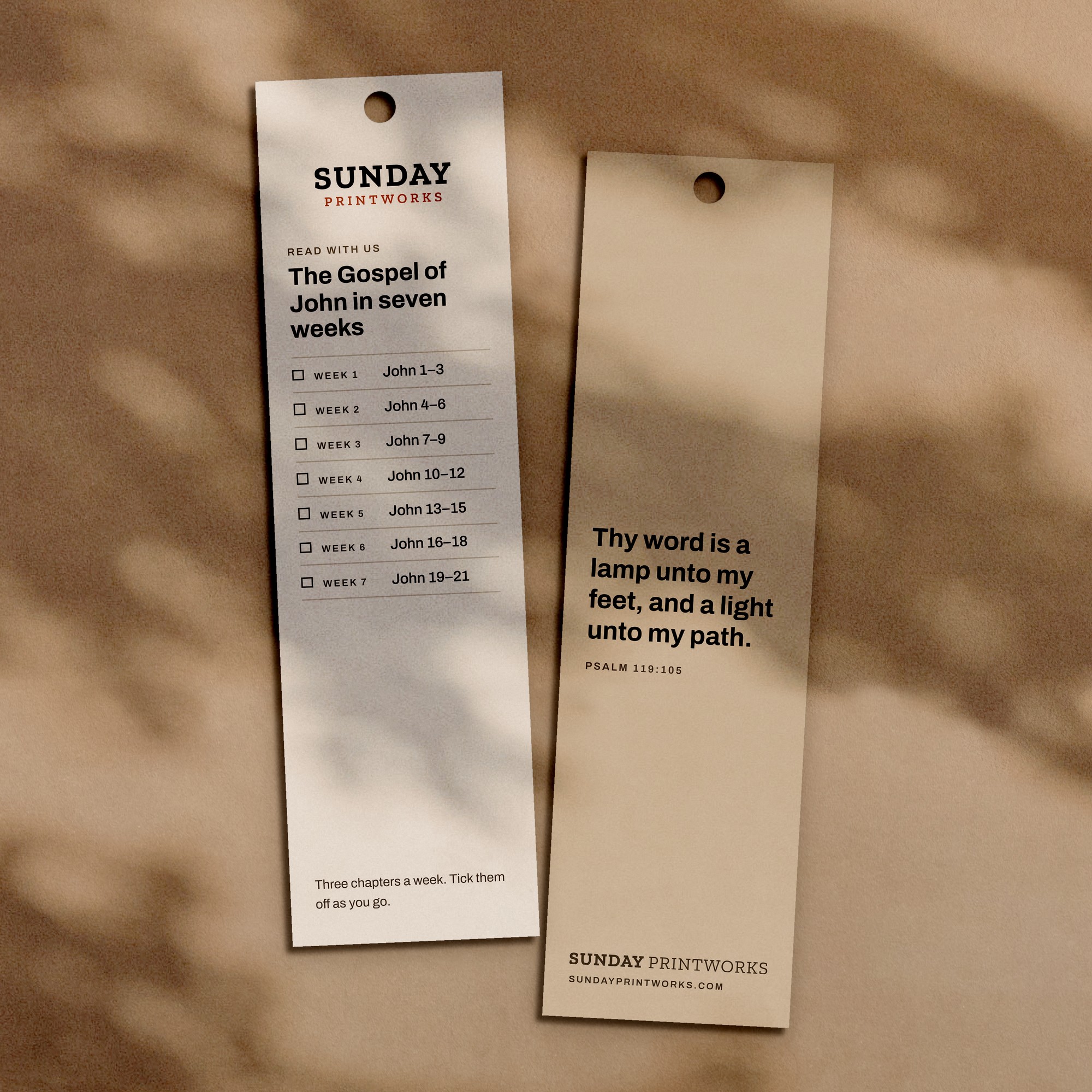 Bookmarks, front and back, with the drilled hole