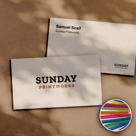 Painted edge business cards with a close-up of the painted edges