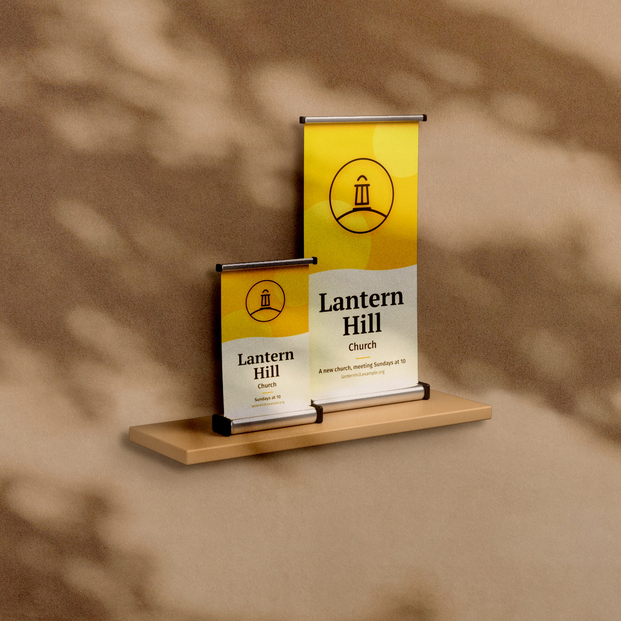 Two tabletop banners for Lantern Hill Church on a shelf, a sample church plant design
