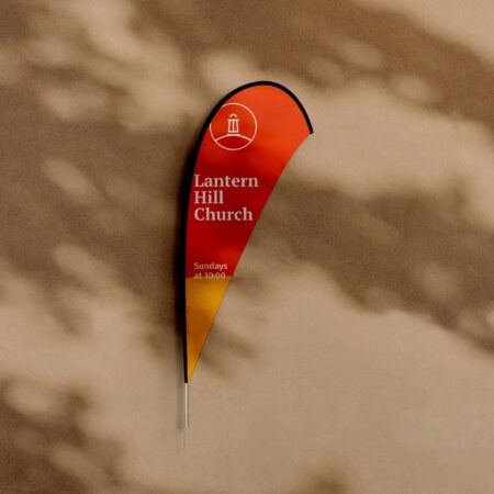 Teardrop flag for a church plant, a sample design on a plaster wall
